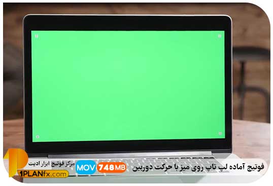 پیش نمایش فوتیج پرده سبز : لپ تاپ روی میز با حرکت دوربین